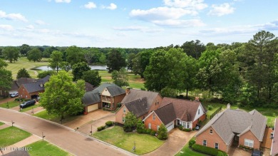 Welcome to your dream lifestyle in this show-stopping 3-bedroom on Hernando Hills Country Club in Mississippi - for sale on GolfHomes.com, golf home, golf lot