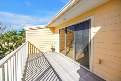 Welcome to coastal living in Treasure Island, a true Norman on Treasure Bay Golf and Tennis in Florida - for sale on GolfHomes.com, golf home, golf lot