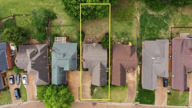 Welcome to your dream lifestyle in this show-stopping 3-bedroom on Hernando Hills Country Club in Mississippi - for sale on GolfHomes.com, golf home, golf lot