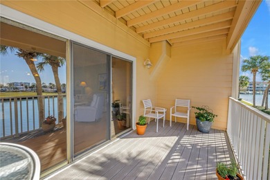 Welcome to coastal living in Treasure Island, a true Norman on Treasure Bay Golf and Tennis in Florida - for sale on GolfHomes.com, golf home, golf lot