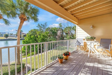 Welcome to coastal living in Treasure Island, a true Norman on Treasure Bay Golf and Tennis in Florida - for sale on GolfHomes.com, golf home, golf lot