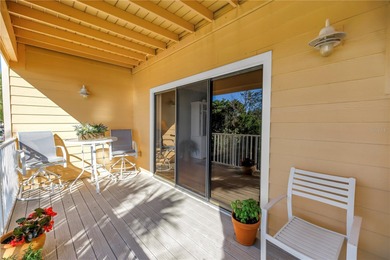 Welcome to coastal living in Treasure Island, a true Norman on Treasure Bay Golf and Tennis in Florida - for sale on GolfHomes.com, golf home, golf lot