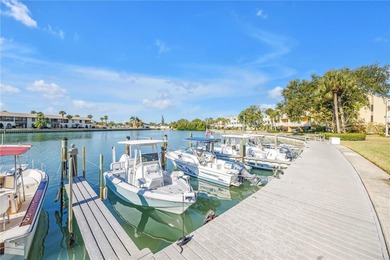 Welcome to coastal living in Treasure Island, a true Norman on Treasure Bay Golf and Tennis in Florida - for sale on GolfHomes.com, golf home, golf lot
