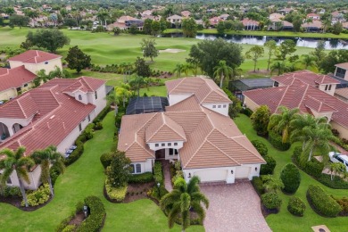 This gorgeous custom Lee Wetherington home is poised on one of on Lakewood Ranch Golf and Country Club in Florida - for sale on GolfHomes.com, golf home, golf lot