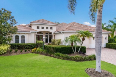 This gorgeous custom Lee Wetherington home is poised on one of on Lakewood Ranch Golf and Country Club in Florida - for sale on GolfHomes.com, golf home, golf lot