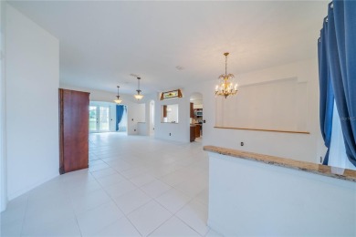 This exquisite home shows like a model. All tile floors on The Club Renaissance in Florida - for sale on GolfHomes.com, golf home, golf lot
