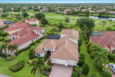 This gorgeous custom Lee Wetherington home is poised on one of on Lakewood Ranch Golf and Country Club in Florida - for sale on GolfHomes.com, golf home, golf lot