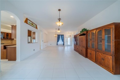 This exquisite home shows like a model. All tile floors on The Club Renaissance in Florida - for sale on GolfHomes.com, golf home, golf lot