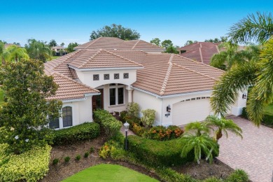 This gorgeous custom Lee Wetherington home is poised on one of on Lakewood Ranch Golf and Country Club in Florida - for sale on GolfHomes.com, golf home, golf lot