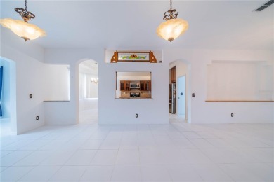 This exquisite home shows like a model. All tile floors on The Club Renaissance in Florida - for sale on GolfHomes.com, golf home, golf lot