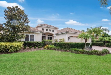 This gorgeous custom Lee Wetherington home is poised on one of on Lakewood Ranch Golf and Country Club in Florida - for sale on GolfHomes.com, golf home, golf lot