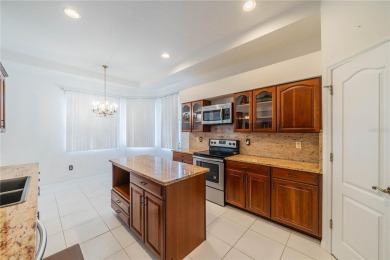 This exquisite home shows like a model. All tile floors on The Club Renaissance in Florida - for sale on GolfHomes.com, golf home, golf lot