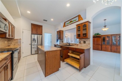 This exquisite home shows like a model. All tile floors on The Club Renaissance in Florida - for sale on GolfHomes.com, golf home, golf lot
