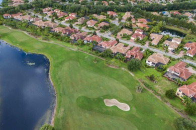 This gorgeous custom Lee Wetherington home is poised on one of on Lakewood Ranch Golf and Country Club in Florida - for sale on GolfHomes.com, golf home, golf lot