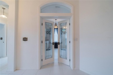 This exquisite home shows like a model. All tile floors on The Club Renaissance in Florida - for sale on GolfHomes.com, golf home, golf lot