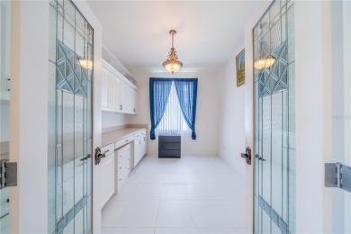 This exquisite home shows like a model. All tile floors on The Club Renaissance in Florida - for sale on GolfHomes.com, golf home, golf lot