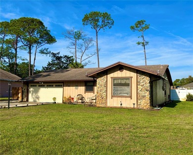 Charming 3 Bedroom 2 Bathroom Home in the *W* Section of Palm on The Grand Club - Pine Lakes Course in Florida - for sale on GolfHomes.com, golf home, golf lot