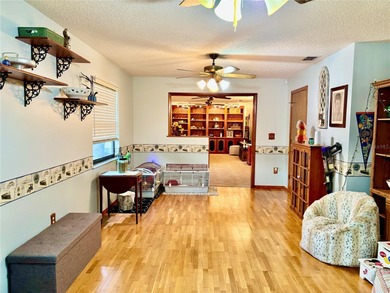 Charming 3 Bedroom 2 Bathroom Home in the *W* Section of Palm on The Grand Club - Pine Lakes Course in Florida - for sale on GolfHomes.com, golf home, golf lot