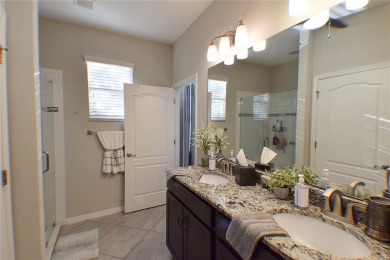 Move-in Ready 3 Bedroom, 2 Bath Home with Serene Pond Views! on Tampa Bay Golf and Country Club in Florida - for sale on GolfHomes.com, golf home, golf lot