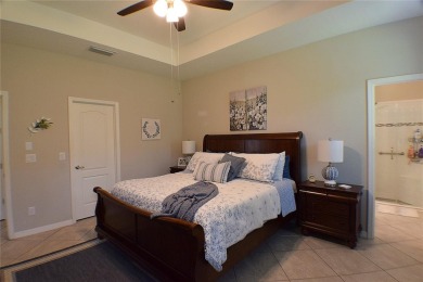 Move-in Ready 3 Bedroom, 2 Bath Home with Serene Pond Views! on Tampa Bay Golf and Country Club in Florida - for sale on GolfHomes.com, golf home, golf lot