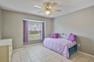 Charming 2-Bedroom, 2-Bath Villa with Garage in the Nantucket on Caloosa Greens Executive Golf Course in Florida - for sale on GolfHomes.com, golf home, golf lot