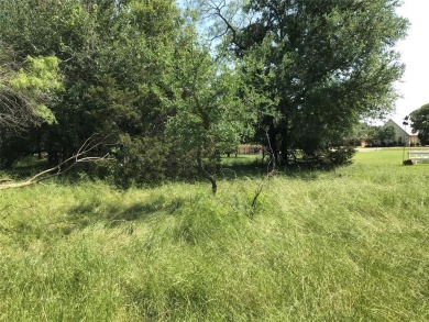 Nearly 1 AC sitting across from the Old Course Driving Range and on White Bluff Resort - Old Course in Texas - for sale on GolfHomes.com, golf home, golf lot