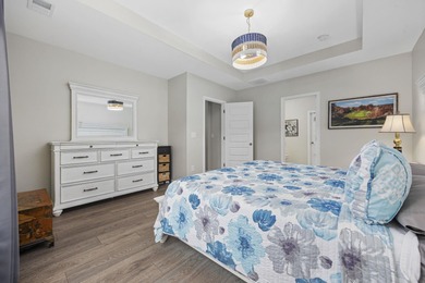 Welcome home to this stunning 3-bedroom, 2-bath home with a flex on Pine Lakes Country Club in South Carolina - for sale on GolfHomes.com, golf home, golf lot