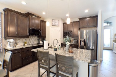 Move-in Ready 3 Bedroom, 2 Bath Home with Serene Pond Views! on Tampa Bay Golf and Country Club in Florida - for sale on GolfHomes.com, golf home, golf lot