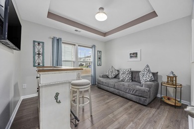 Welcome home to this stunning 3-bedroom, 2-bath lakefront home on Pine Lakes Country Club in South Carolina - for sale on GolfHomes.com, golf home, golf lot