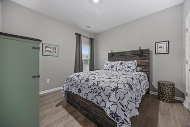 Welcome home to this stunning 3-bedroom, 2-bath lakefront home on Pine Lakes Country Club in South Carolina - for sale on GolfHomes.com, golf home, golf lot