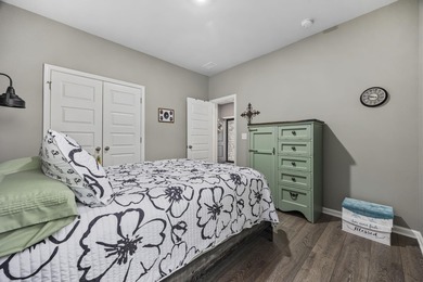 Welcome home to this stunning 3-bedroom, 2-bath lakefront home on Pine Lakes Country Club in South Carolina - for sale on GolfHomes.com, golf home, golf lot