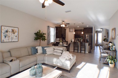 Move-in Ready 3 Bedroom, 2 Bath Home with Serene Pond Views! on Tampa Bay Golf and Country Club in Florida - for sale on GolfHomes.com, golf home, golf lot