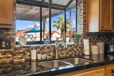 Located minutes from world-class amenities, the home boasts on Palm Desert Country Club in California - for sale on GolfHomes.com, golf home, golf lot