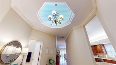 Welcome to this charming 2-bedroom, 2-bathroom villa with a den on Cypress Lake Country Club in Florida - for sale on GolfHomes.com, golf home, golf lot