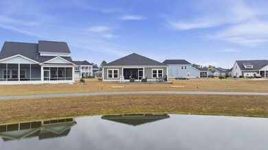 Welcome home to this stunning 3-bedroom, 2-bath lakefront home on Pine Lakes Country Club in South Carolina - for sale on GolfHomes.com, golf home, golf lot