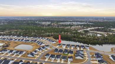 Welcome home to this stunning 3-bedroom, 2-bath lakefront home on Pine Lakes Country Club in South Carolina - for sale on GolfHomes.com, golf home, golf lot