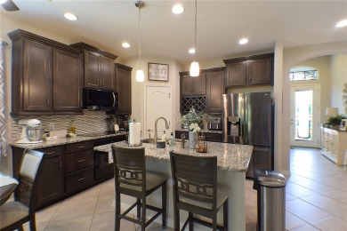 Move-in Ready 3 Bedroom, 2 Bath Home with Serene Pond Views! on Tampa Bay Golf and Country Club in Florida - for sale on GolfHomes.com, golf home, golf lot