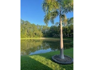 Move-in Ready 3 Bedroom, 2 Bath Home with Serene Pond Views! on Tampa Bay Golf and Country Club in Florida - for sale on GolfHomes.com, golf home, golf lot
