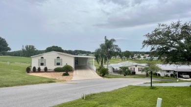 Located on a quiet street with a view of the Golf Course and on Water Oak Country Club Estates in Florida - for sale on GolfHomes.com, golf home, golf lot