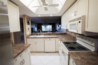 Top-Floor Condo with Golf Course Views, Elevator Access on Tarpon Springs Golf Course in Florida - for sale on GolfHomes.com, golf home, golf lot