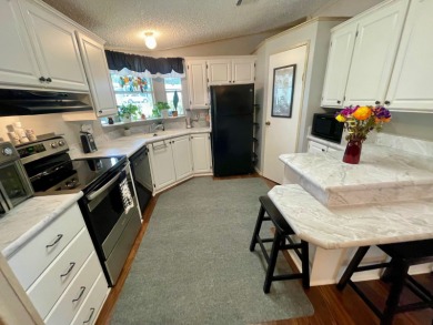 Located on a quiet street with a view of the Golf Course and on Water Oak Country Club Estates in Florida - for sale on GolfHomes.com, golf home, golf lot
