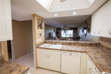 Top-Floor Condo with Golf Course Views, Elevator Access on Tarpon Springs Golf Course in Florida - for sale on GolfHomes.com, golf home, golf lot