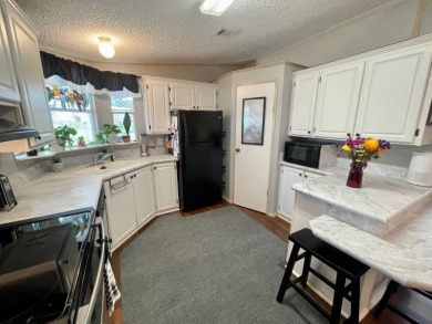 Located on a quiet street with a view of the Golf Course and on Water Oak Country Club Estates in Florida - for sale on GolfHomes.com, golf home, golf lot