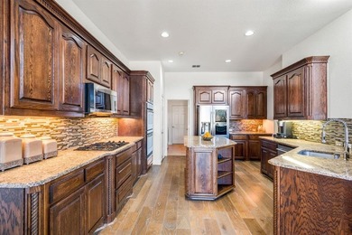 Welcome to 4114 Peace Drive in Frisco, a stunning home in a on Heritage Lakes - Par 3 - 9 Hole Course in Texas - for sale on GolfHomes.com, golf home, golf lot