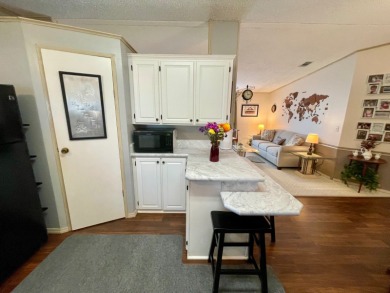 Located on a quiet street with a view of the Golf Course and on Water Oak Country Club Estates in Florida - for sale on GolfHomes.com, golf home, golf lot