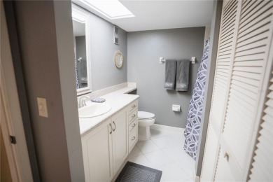 Top-Floor Condo with Golf Course Views, Elevator Access on Tarpon Springs Golf Course in Florida - for sale on GolfHomes.com, golf home, golf lot