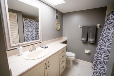 Top-Floor Condo with Golf Course Views, Elevator Access on Tarpon Springs Golf Course in Florida - for sale on GolfHomes.com, golf home, golf lot