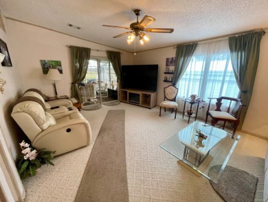 Located on a quiet street with a view of the Golf Course and on Water Oak Country Club Estates in Florida - for sale on GolfHomes.com, golf home, golf lot