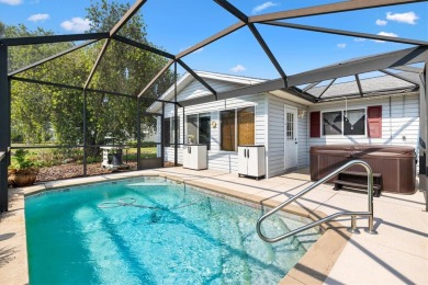3/2 DOGWOOD WITH A POOL & 4 PERSON HOT TUB!  Located in the on The Links of Spruce Creek in Florida - for sale on GolfHomes.com, golf home, golf lot