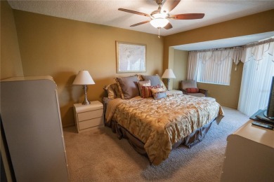 Top-Floor Condo with Golf Course Views, Elevator Access on Tarpon Springs Golf Course in Florida - for sale on GolfHomes.com, golf home, golf lot
